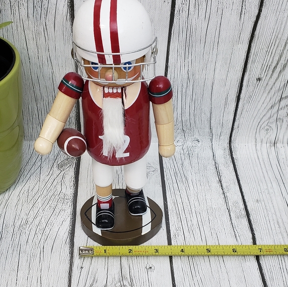 Wooden 9" Nutcracker w/ Helmet & Holding Football - Picture 9 of 9